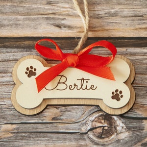 Wooden Dog bone ornament. Paw print ornament. Dog first Christmas. Boxer dog gifts. Personalized dog bone Red Ribbon