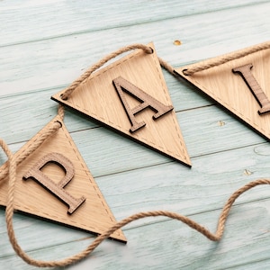 Wooden bunting featuring two tone wood for children's room