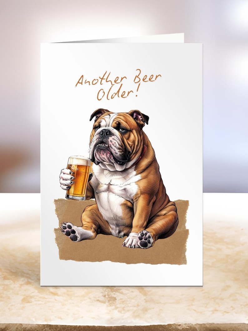 May include: A greeting card with a cartoon bulldog holding a glass of beer. The card says "Another Beer Older!"