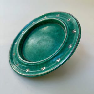 Wilhelm Käge for Gustavsberg, Sweden - Argenta plate #1609 I A with sliver floral inlay.