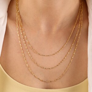 thumbnail image 2 of 585 Real Gold Singapore Chain Necklace - 1.2mm, Rotated, 38-50cm, 14K Yellow Gold 2 of 6