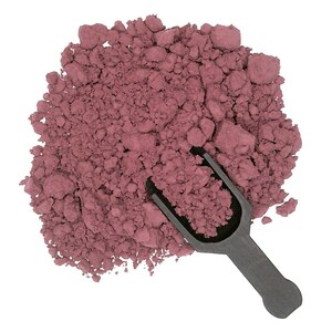 May include: A scoop of deep pink powder with a black plastic scoop. The powder is finely ground and has a slightly grainy texture.