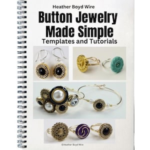 May include: A spiral-bound book titled "Button Jewelry Made Simple" with templates and tutorials. The image showcases various button jewelry pieces, including earrings, rings, and bracelets. The jewelry features gold, silver, black, and pearl accents.