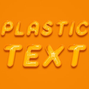 May include: A 3D rendering of the words "PLASTIC TEXT" in a bright yellow, glossy, plastic-like font. The letters are slightly raised and have a slight shadow effect.
