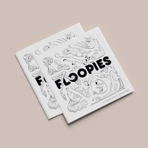 May include: A black and white coloring book with the title "Floopies: A Coloring Book by Lauren Barger". The cover features a variety of whimsical creatures and designs.