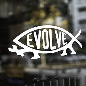 May include: White decal with the word "EVOLVE" inside a stylized fish symbol. The image is set against a blurred background of a building exterior. The logo for "Enduring Logic" is in the upper left corner.
