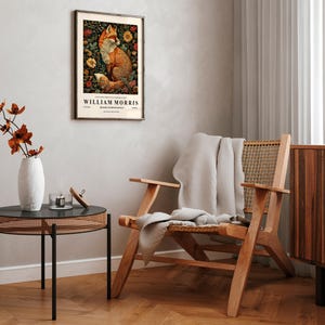 May include: A framed print of a fox surrounded by flowers. The print is titled "William Morris" and features a vintage design.