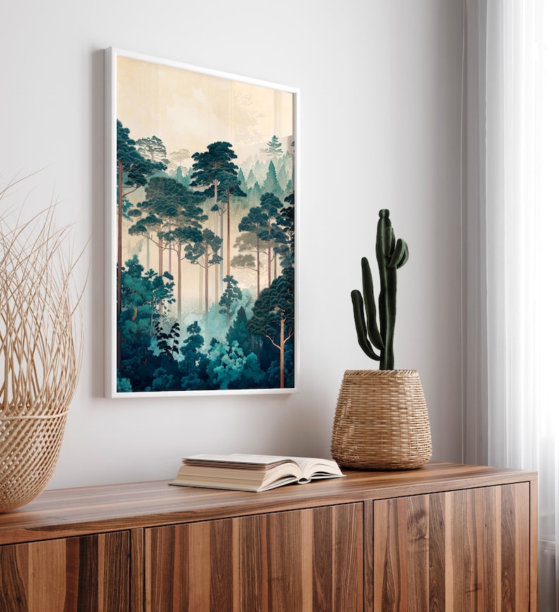 May include: A framed print of a forest scene with tall, dark green trees and a light blue sky. The trees are arranged in a staggered pattern, creating a sense of depth and perspective. The print is framed in a white frame and is hanging on a white wall.