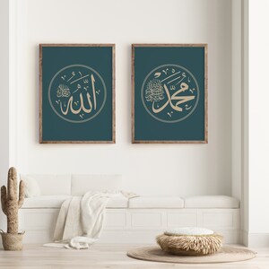 May include: Two framed prints with teal backgrounds and gold calligraphy. The left print features the word "Allah" in Arabic script. The right print features the phrase "Muhammad" in Arabic script.