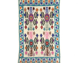 Tapis bleu de pure laine du Guatemala. Tapis de laine bleue 100% fait main.