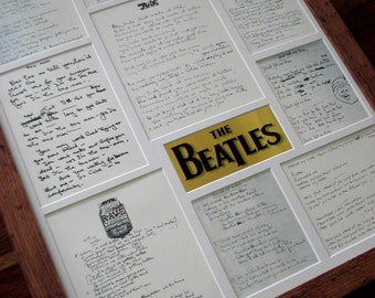 May include: A framed display of handwritten lyrics by The Beatles, including "Taxman", "Rave On", "She's Leaving Home", "You've Got To Hide Your Love Away", "Help!" and "Drive My Car".