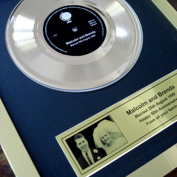 Your own personalised 7" golden vinyl framed record single record award