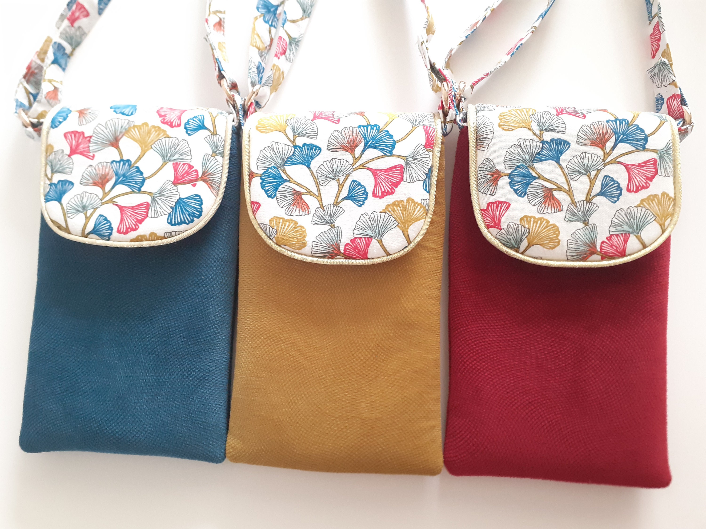 cell phone pouch with adjustable shoulder strap for smartphone or iPhone quilted in blue, mustard or burgundy fabric and velvet