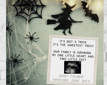 May include: A Halloween-themed pregnancy announcement with a black silhouette of a witch flying on a broomstick and a bat. A white letter board with black letters reads "It's not a trick, it's the sweetest treat. Our family is growing by one little heart and two little feet. Baby Fulmer arriving June 20XX". A black and white sonogram image is displayed on the letter board.