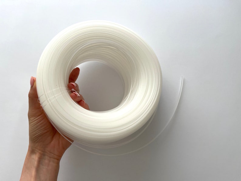 Clear plastic boning set for garment making, suitable for bridal wear, corsets, and structured clothing