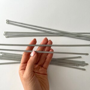 Close-up of flexible spiral steel corset boning, 1/2 inch wide for dressmaking and costume design