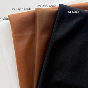 May include: Close-up of four fabric swatches in different colors. The colors are labeled: #1 Ivory White, #2 Ligth Nude, #3 Dark Nude, and #4 Black. The fabrics appear to be a sheer, mesh-like material.