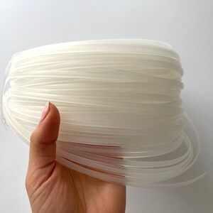 Clear flexible boning pieces for garment structure, available in 5mm size for dressmaking