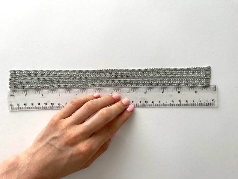 Spiral steel boning used in corset design, providing durable structure and flexibility