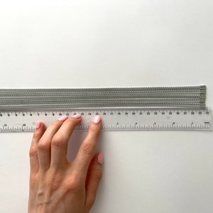 Detailed view of spiral steel boning, ideal for corsets and structured garments