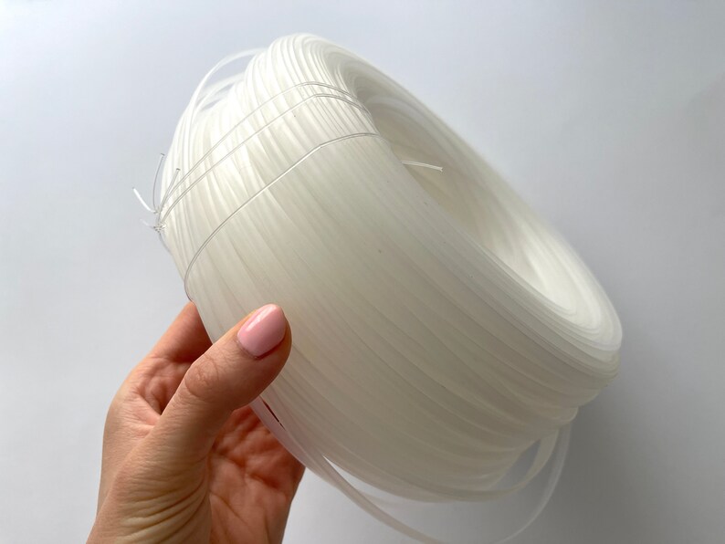 Clear plastic boning flexibility demonstration, ideal for comfortable corsets and costume design