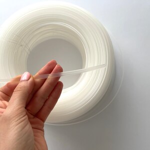 Close-up of transparent plastic boning for corsets, perfect for invisible support in garments