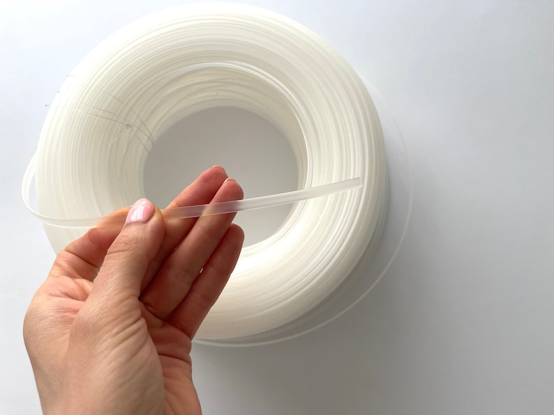Close-up of transparent plastic boning for corsets, perfect for invisible support in garments