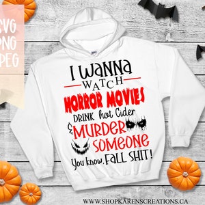Puede incluir: Sudadera con capucha blanca con el texto "I wanna -WATCH- HORROR MOVIES DRINK hot Cider & MURDER SOMEONE You know, FALL SHIT!" en negro y rojo. El texto está sobre un fondo blanco.