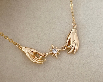 Gold Hand Star Necklace: Delicate Charm, Cubic Zirconia
