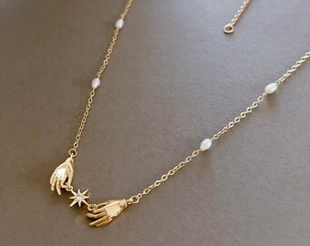 Freshwater Pearl Necklace: Gold Hand Charms & Cubic Zirconia Star