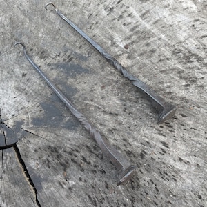Railroad spike meat turner