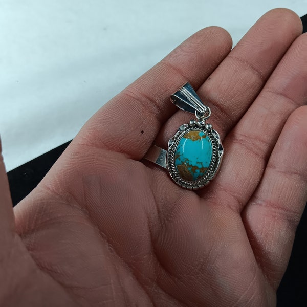 Samuel Yellowhair made silver and turquoise pendant