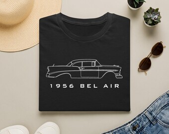 May include: A black t-shirt featuring a white line art illustration of a 1956 Bel Air car in profile, with the text 1956 BEL AIR printed in white capital letters underneath the car graphic, centered on the front of the garment.