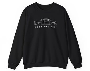 May include: A black long-sleeve sweatshirt featuring a white line art illustration of a 1956 Bel Air car centered on the chest. Below the car graphic, the text 1956 BEL AIR is printed in a clean, white, sans-serif font on the front of the garment.
