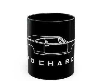 May include: Black ceramic mug featuring a white outline of a classic car. The car's side profile is visible, including the door and interior details. The text "70 CHARG" is printed in white below the car image.
