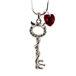 Beautiful Rhinestone encrusted Devils horns and tail with your choice of Swarovski Crystal Heart Accent in Robins egg or Slate grey Gift box