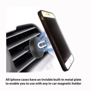 May include: A black magnetic car phone mount attached to an air vent. A black iPhone is attached to the mount.