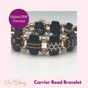 May include: Black and gold beaded bracelet with a carrier bead design. The bracelet is made with small square beads and round beads. The image includes the text "On A String" and "Carrier Bead Bracelet".