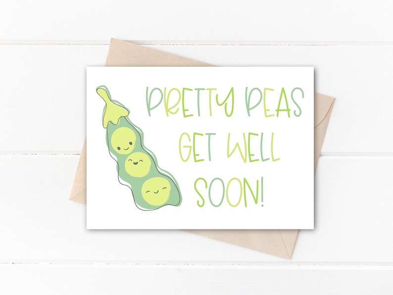 May include: A white greeting card with the text "Pretty Peas Get Well Soon!" in green and light green. The card features a cartoon illustration of a pea pod with three smiling peas. The card is inside a brown envelope.