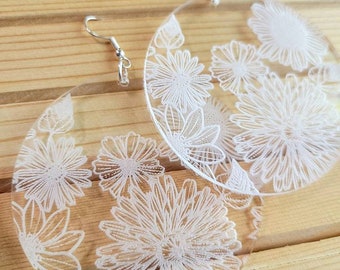 Laser cut floral lacey clear acrylic earrings
