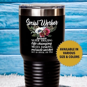 May include: Black stainless steel tumbler with a floral design and the text "Social Worker because SUPER AMAZING life changing MULTI-TASKING miracle worker ISN'T AN OFFICIAL JOB TITLE". The tumbler is available in various sizes and colors.