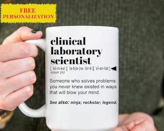 May include: White ceramic mug with a black design that reads "clinical laboratory scientist" with a definition and the words "ninja, rockstar, legend".