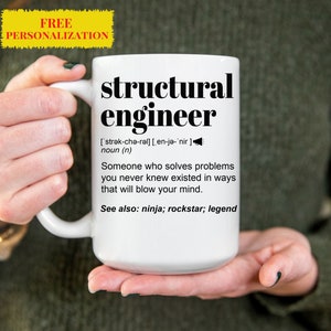 May include: White ceramic mug with a black graphic that reads "structural engineer" and a definition of the word. The definition includes the phonetic spelling and the phrase "Someone who solves problems you never knew existed in ways that will blow your mind." The mug also includes the text "See also: ninja; rockstar; legend".
