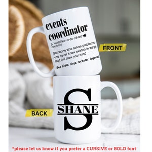 May include: White ceramic mug with a black design. The mug has the word "events coordinator" defined with a phonetic pronunciation and a description of the role. The mug also has the name "SHANE" in black lettering on the bottom.