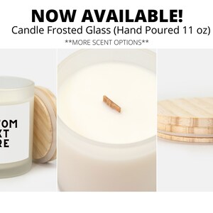 May include: A frosted glass candle with a wooden lid and a white label that says "CUSTOM TEXT HERE". The candle is hand-poured and is 11 ounces.