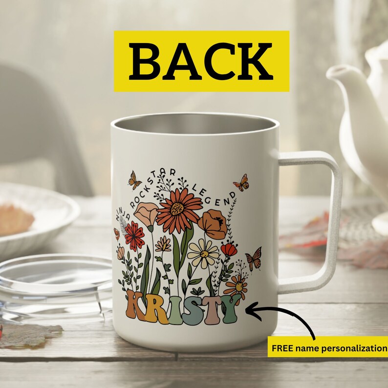 Puede incluir: Taza de viaje de acero inoxidable blanca con un dise&ntilde;o floral y el texto "Rockstar Legend" y "Kristy".