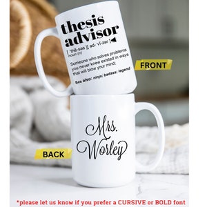 May include: Two white ceramic mugs stacked on top of each other. The top mug has the text "thesis advisor" with a definition. The bottom mug has the name "Mrs. Worley" in cursive. The image also includes the text "FRONT" and "BACK".