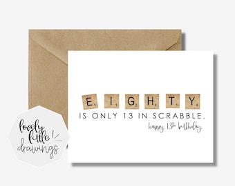 May include: A white greeting card with the text "EIGHTY IS ONLY 13 IN SCRABBLE. happy 13th birthday" in black. The word "EIGHTY" is spelled out using Scrabble tiles. A brown envelope is behind the card.