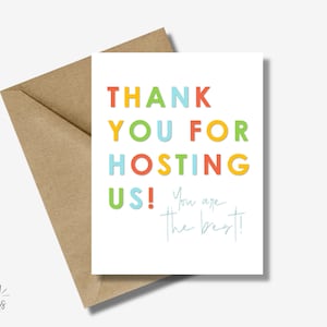 May include: A white card with the text "THANK YOU FOR HOSTING US! You are the best!" in colorful letters. The letters are in different colors, including red, orange, yellow, green, blue, and purple.