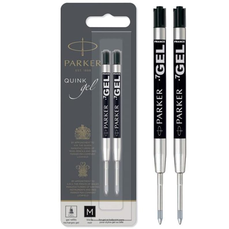 May include: Two Parker Quink gel pen refills in black ink with a medium point. The refills are presented in a grey blister pack featuring the Parker logo, royal crests, and text indicating they are made in France for gel or ballpoint pens.